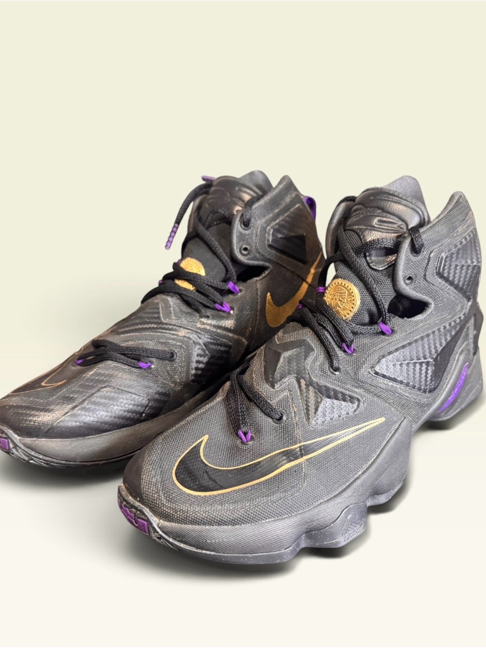 Nike Men’s Black Sneakers with Gold Swoosh and Purple Accents